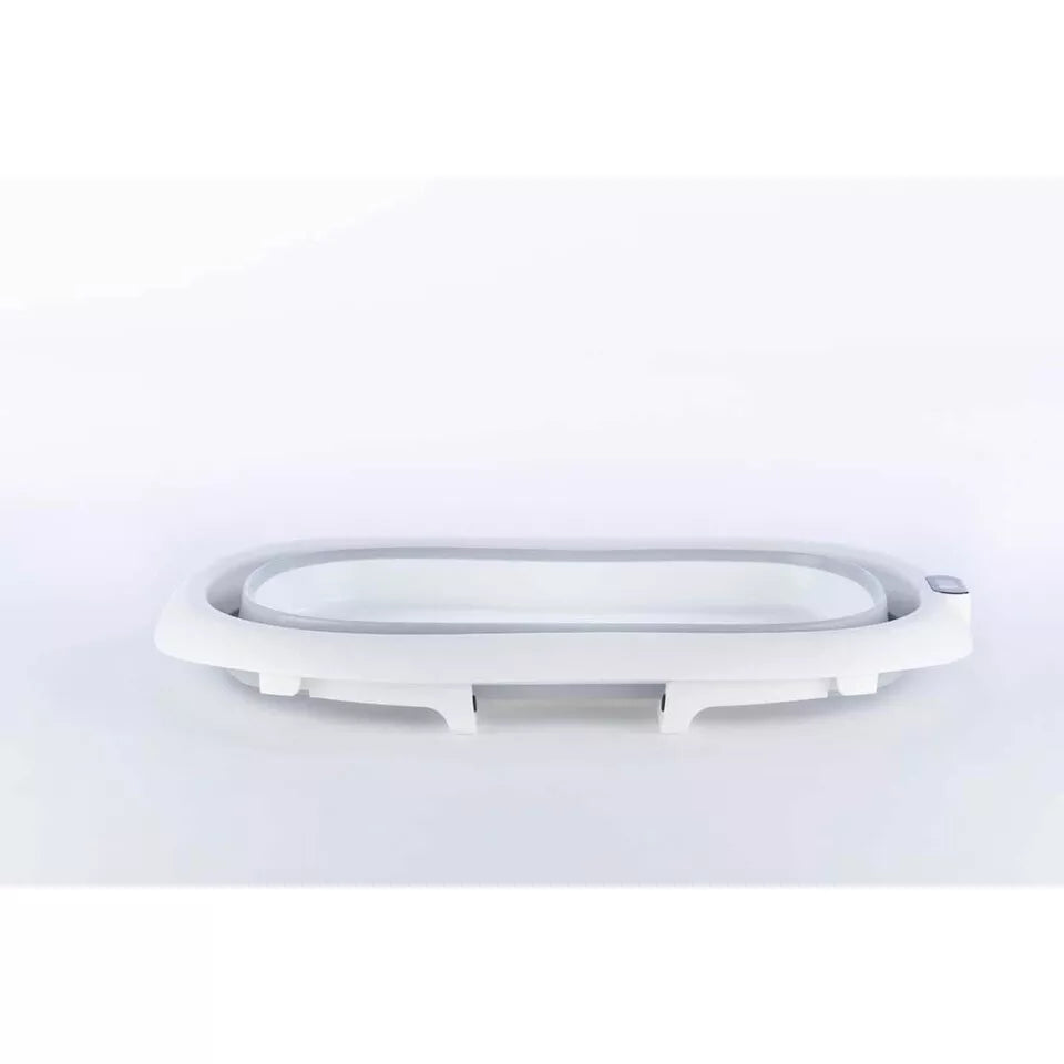 Sulankstoma kūdikio vonelė su termometru ir silikoniniu gultuku BATH&CARE Pink