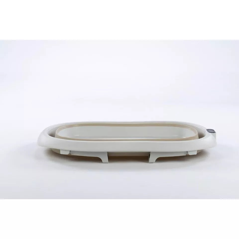 Sulankstoma kūdikio vonelė su termometru ir silikoniniu gultuku BATH&CARE Beige