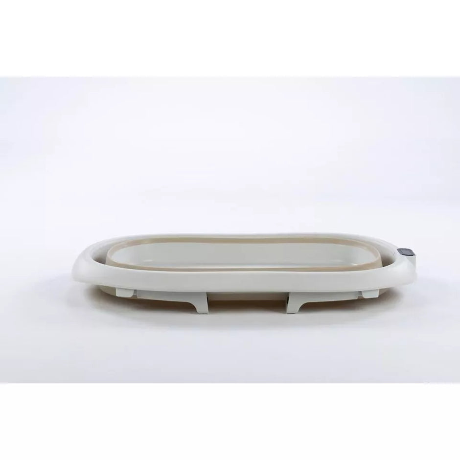 Sulankstoma kūdikio vonelė su termometru ir silikoniniu gultuku BATH&CARE Beige